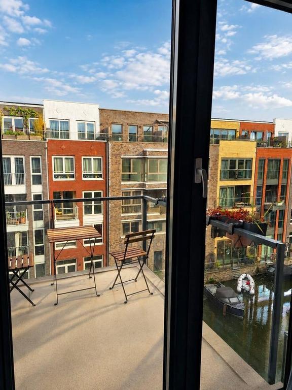 Waterzicht en balkon in Houthavens - Afbeelding 7