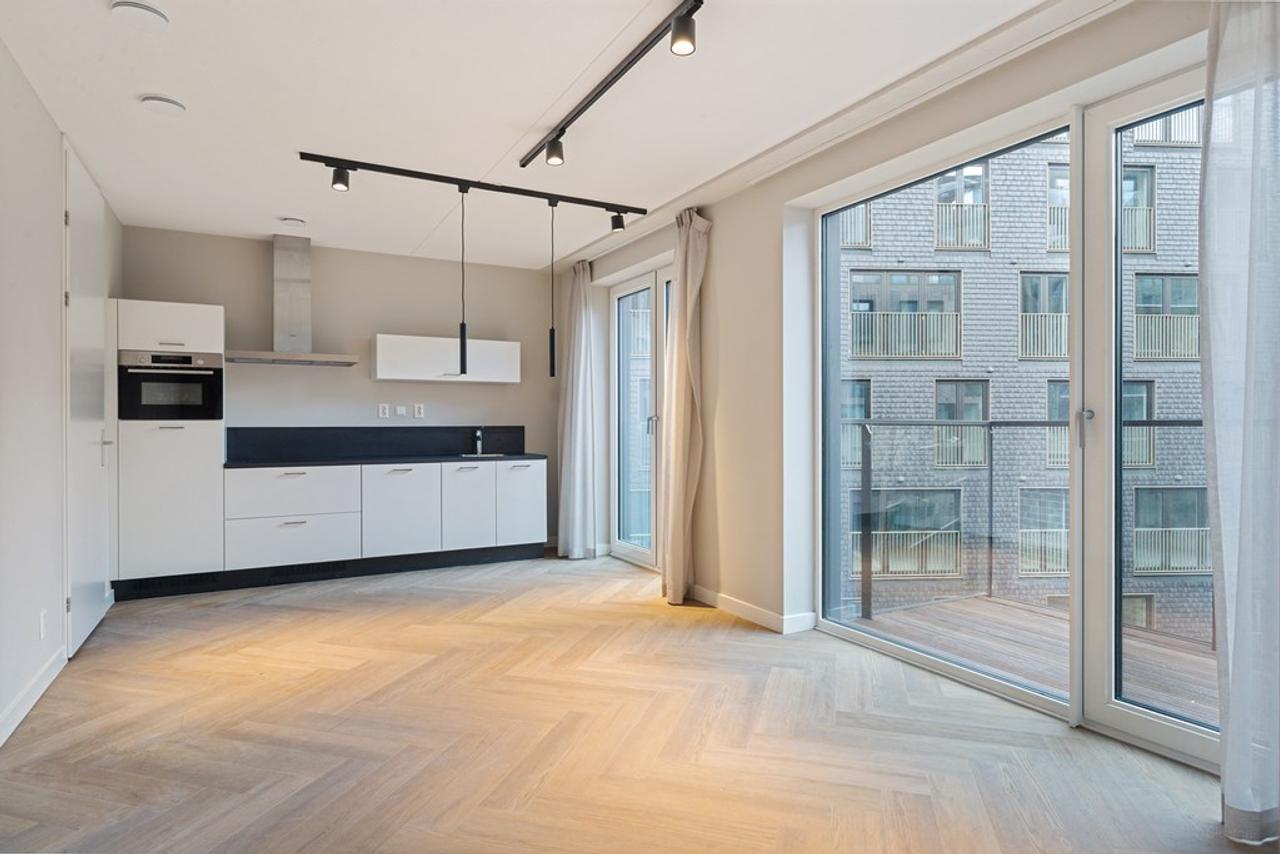Split-level appartement met balkon - Afbeelding 1