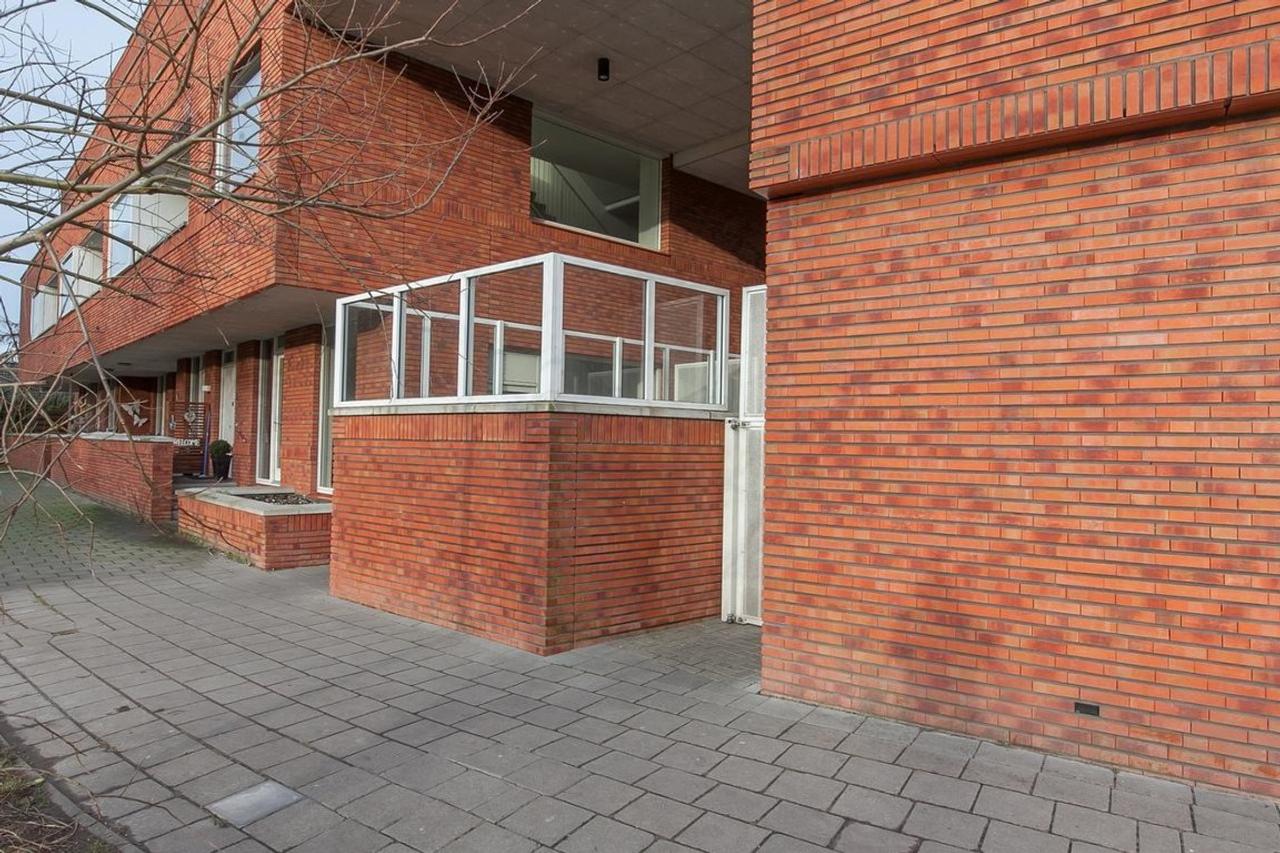 100 m2 gelijkvloers met eigen parkeerplek - Afbeelding 2
