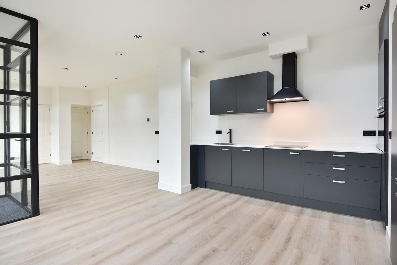 2-slaapkamer appartement met tuin - Afbeelding 1