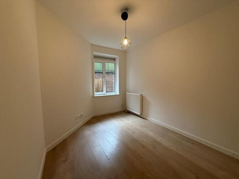 2-slaapkamer appartement met tuin - Afbeelding 7