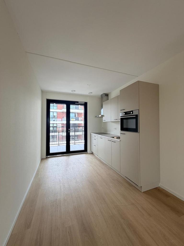 Nieuwbouwappartement met balkon en parkeerplek - Afbeelding 3