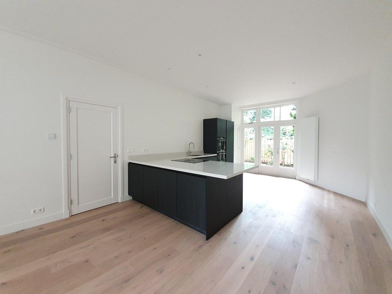 3-slaapkamer appartement met tuin - Afbeelding 2