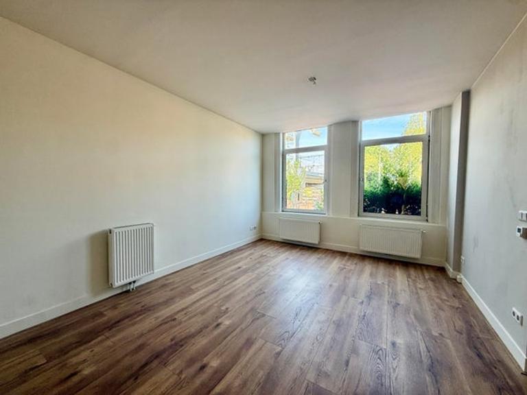 Begane grond appartement met tuin - Afbeelding 1