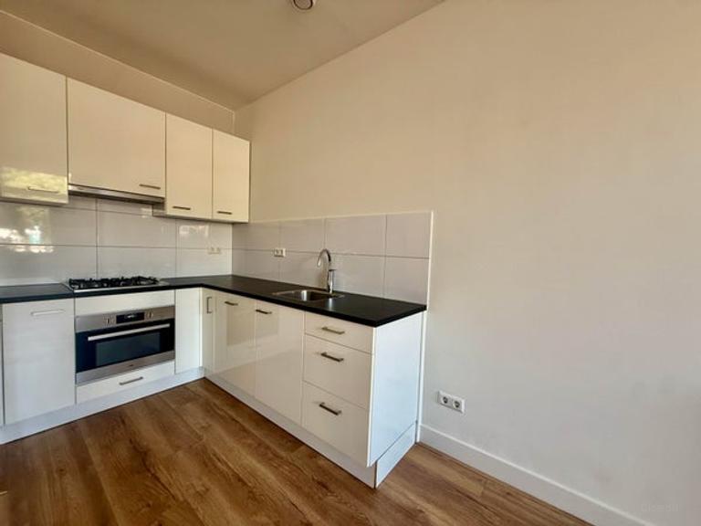 Begane grond appartement met tuin - Afbeelding 2