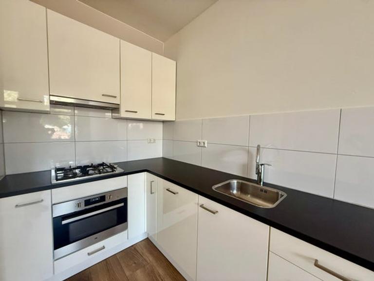 Begane grond appartement met tuin - Afbeelding 3