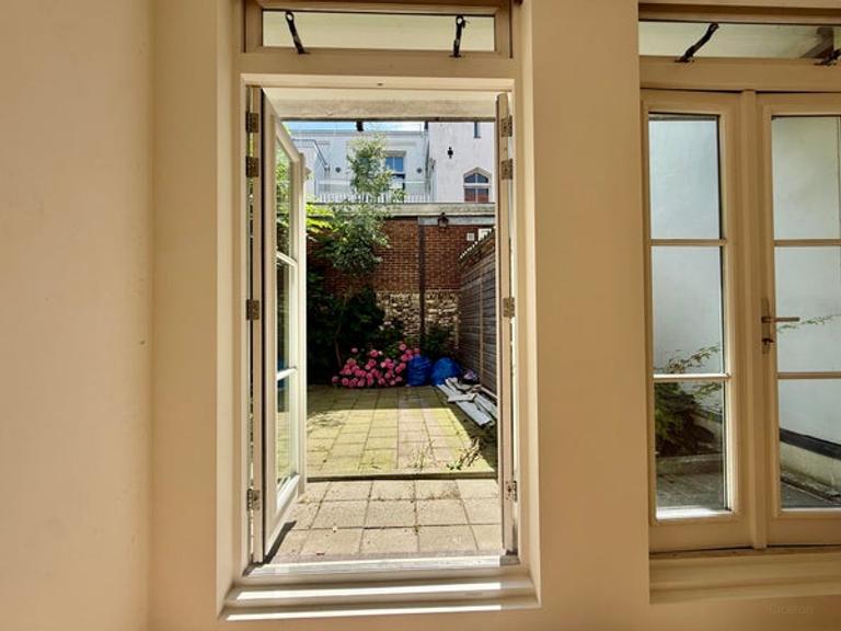 Begane grond appartement met tuin - Afbeelding 5