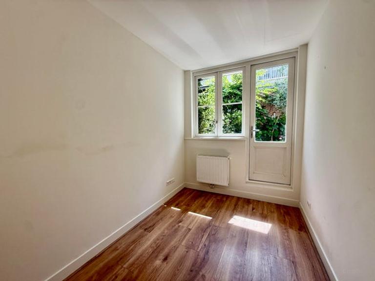 Begane grond appartement met tuin - Afbeelding 6