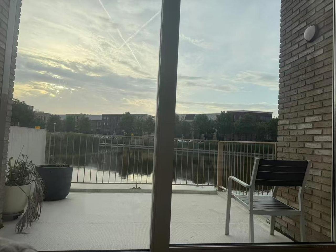 Split-level gezinshuis met waterzicht - Afbeelding 3