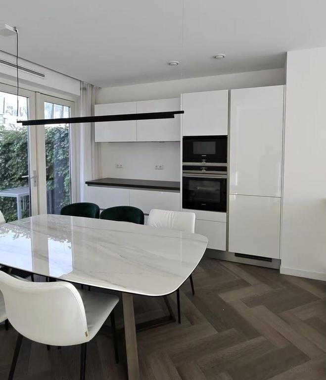 Split-level gezinshuis met waterzicht - Afbeelding 4