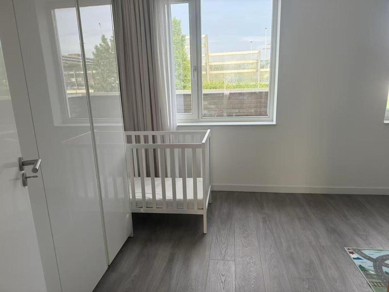 Split-level gezinshuis met waterzicht - Afbeelding 11