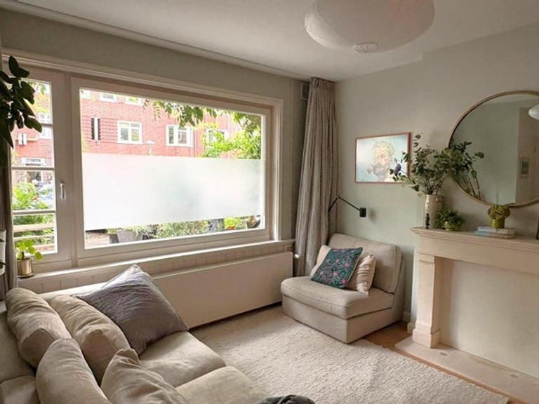 Benedenhuis met zonnige tuin in Rivierenbuurt - Afbeelding 2