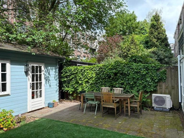 Benedenhuis met zonnige tuin in Rivierenbuurt - Afbeelding 10