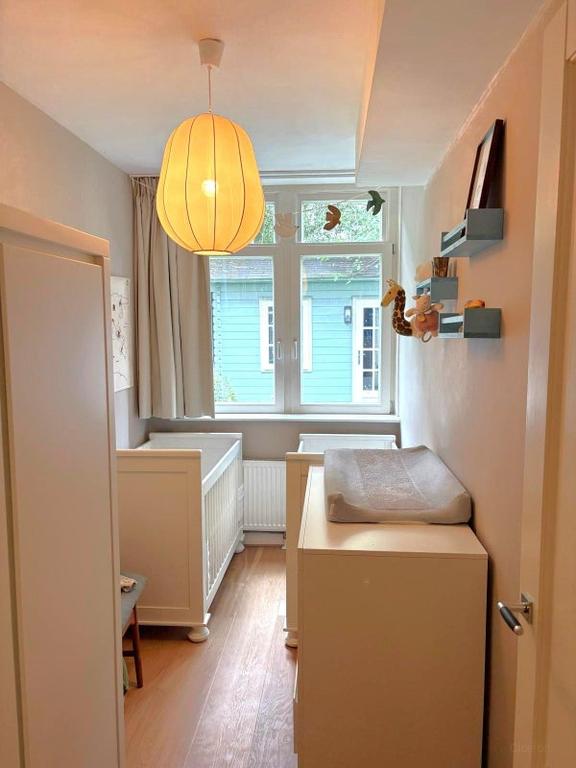 Benedenhuis met zonnige tuin in Rivierenbuurt - Afbeelding 15