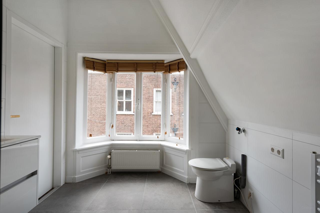 Driedubbel bovenhuis in hartje Den Haag - Afbeelding 23