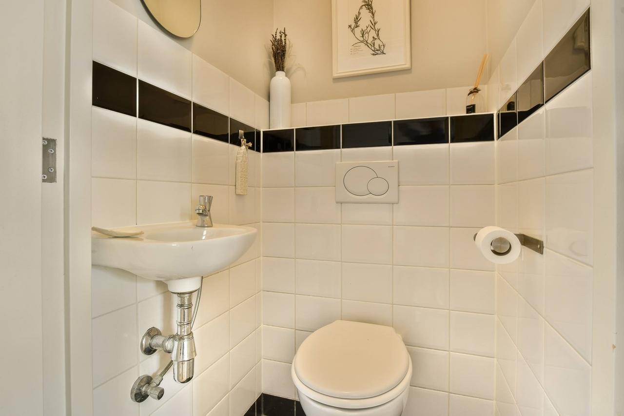Licht 2-slaapkamer appartement in De Pijp - Afbeelding 22