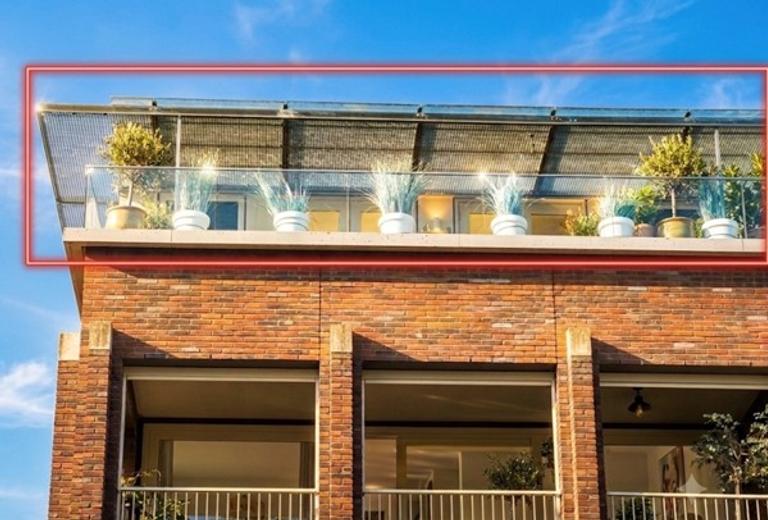Penthouse met terras in Boddenkamp - Afbeelding 2