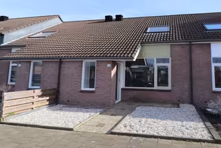 Tussenwoning met diepe tuin in Brouwhuis