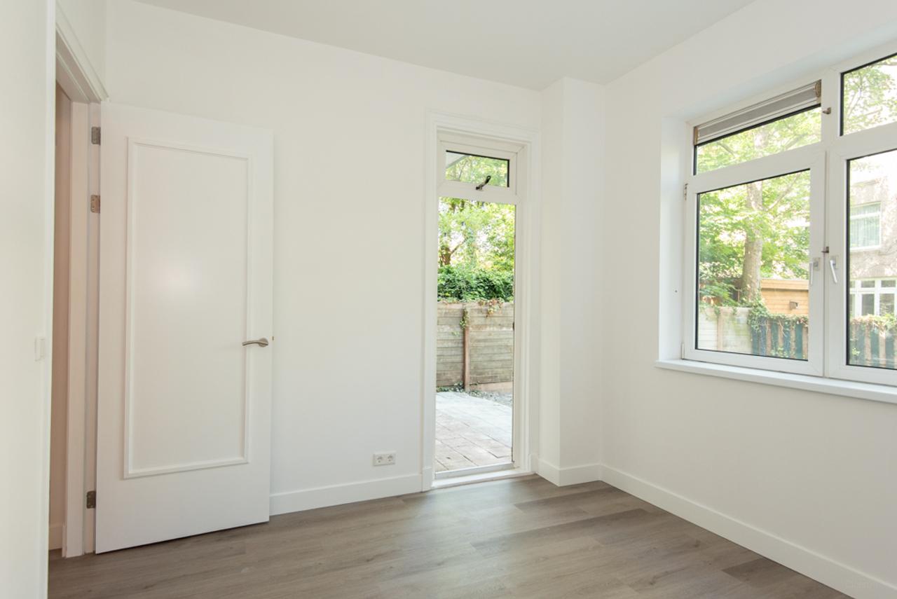 Benedenwoning met grote tuin in Amsterdam - Afbeelding 5