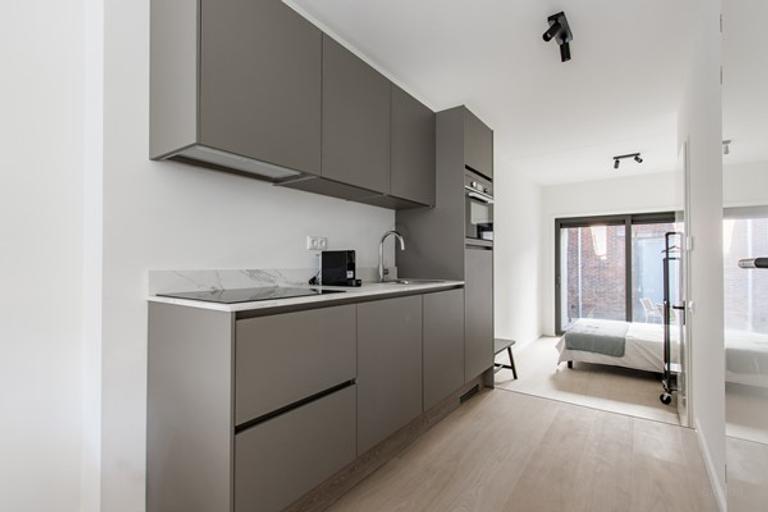 Lichte studio met loft en tuin in centrum - Afbeelding 4