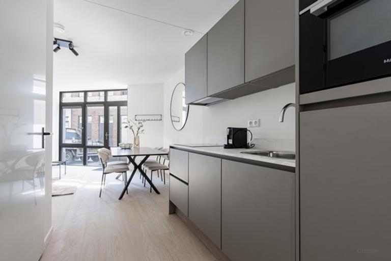 Lichte studio met loft en tuin in centrum - Afbeelding 5