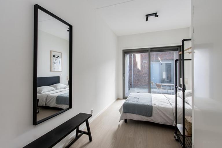 Lichte studio met loft en tuin in centrum - Afbeelding 6