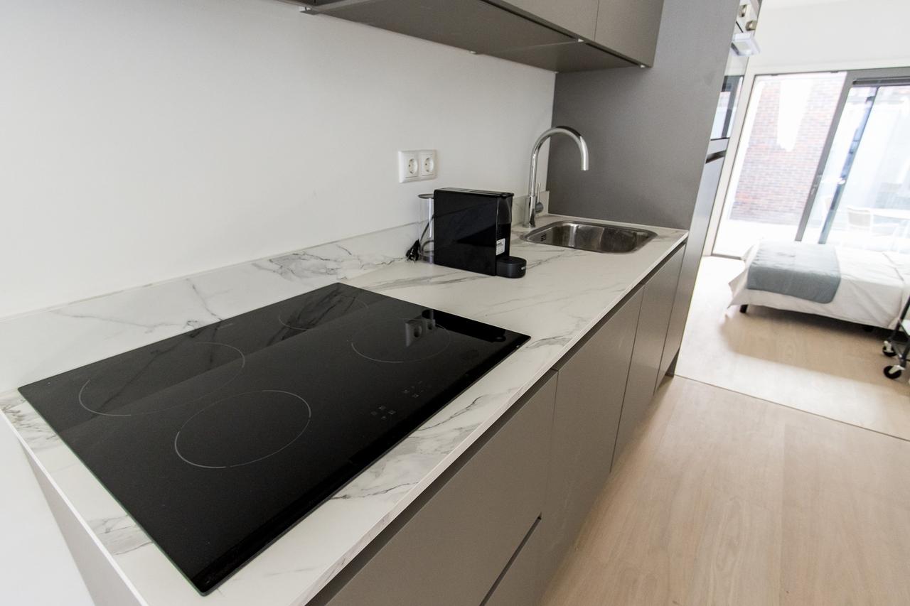 Lichte studio met loft en tuin in centrum - Afbeelding 13