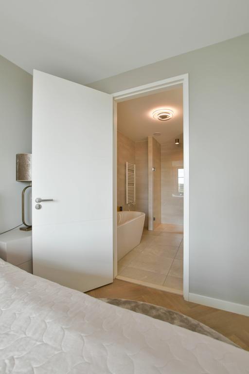 Penthouse met groot balkon op Oostenburg - Afbeelding 19