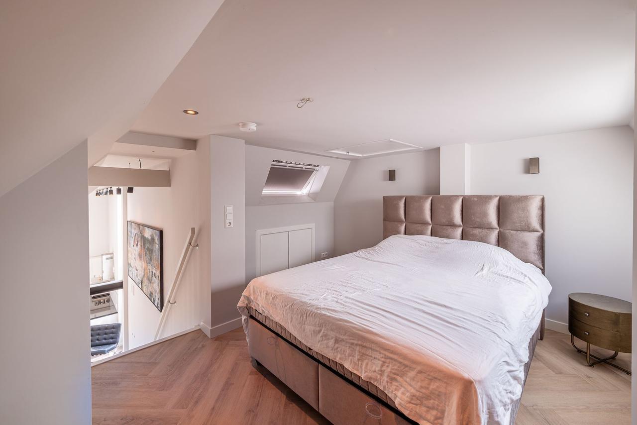 Split-level appartement met open vide - Afbeelding 4