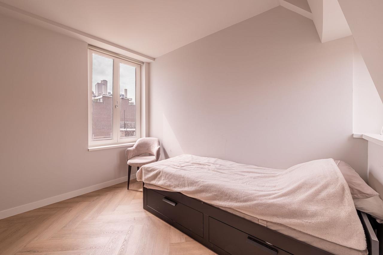 Split-level appartement met open vide - Afbeelding 6