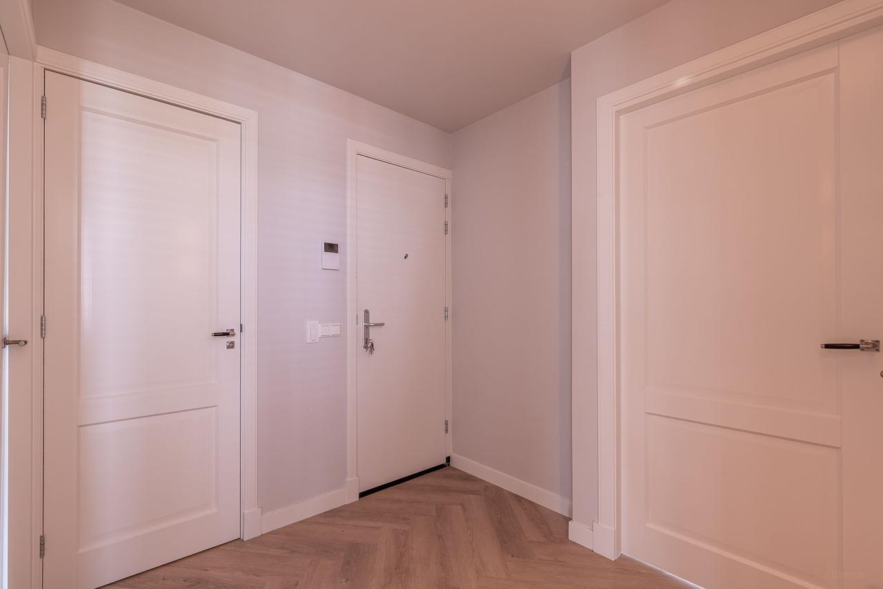 Split-level appartement met open vide - Afbeelding 8