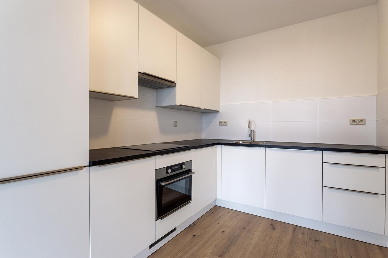 111 m² appartement met lift aan de Blaak - Afbeelding 3
