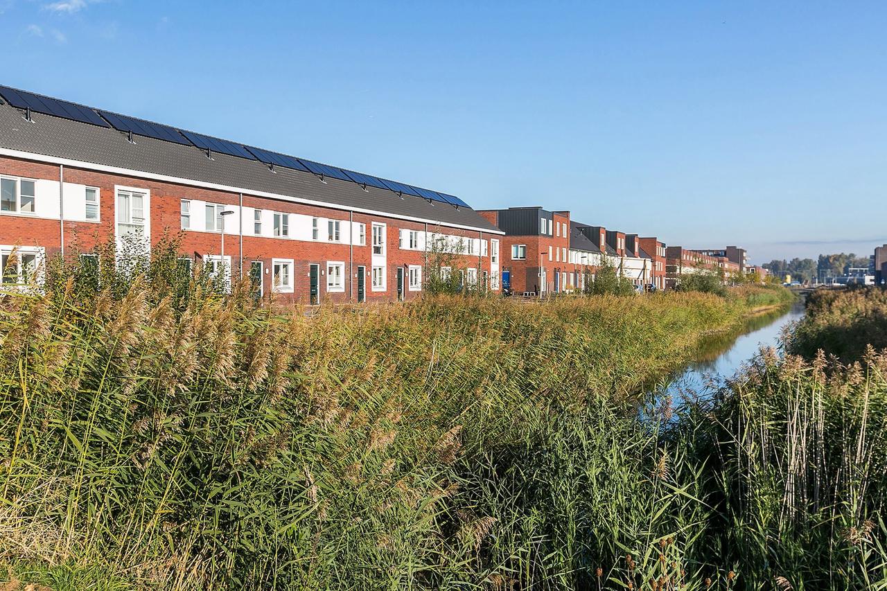 117 m² huis met tuin en eigen parkeerplek - Afbeelding 17