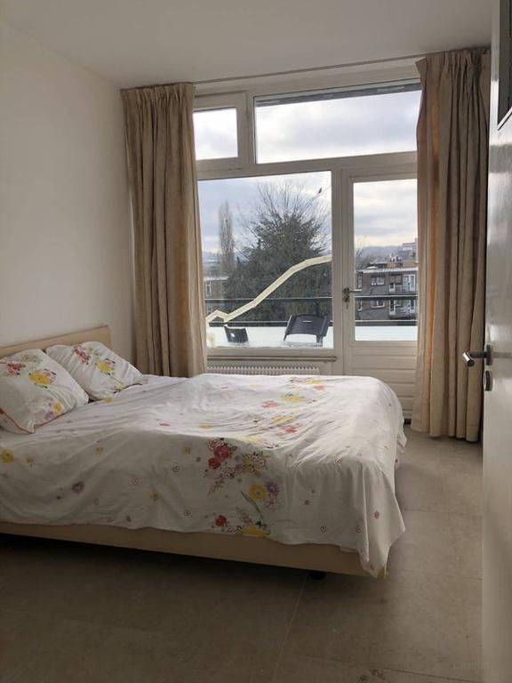 Furnished 2-Bedroom Apartment with Balcony - Image 7