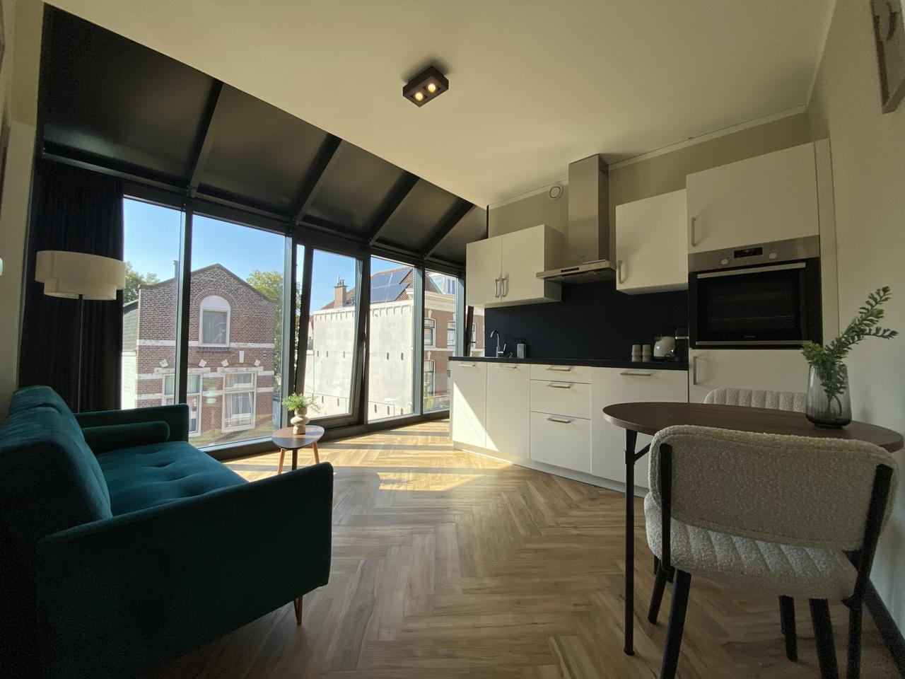 Gemeubileerd 2-kamerappartement met airco - Afbeelding 1