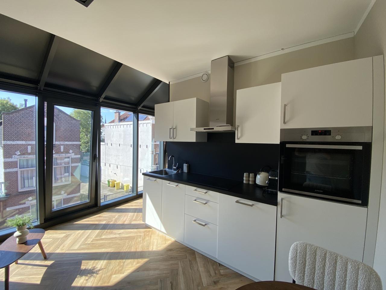 Gemeubileerd 2-kamerappartement met airco - Afbeelding 4