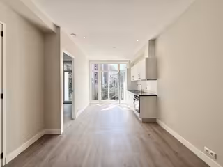 Drieslaapkamerappartement met balkon