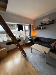Bright student room with separate sleeping nook