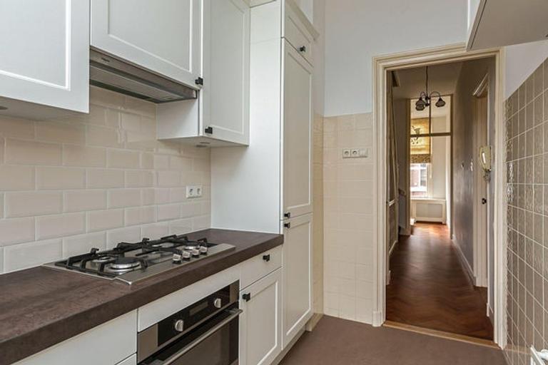 Herenhuis van 185 m² met balkon in Bezuidenhout - Afbeelding 13