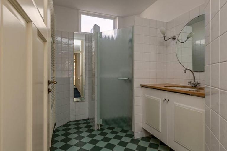 Herenhuis van 185 m² met balkon in Bezuidenhout - Afbeelding 23