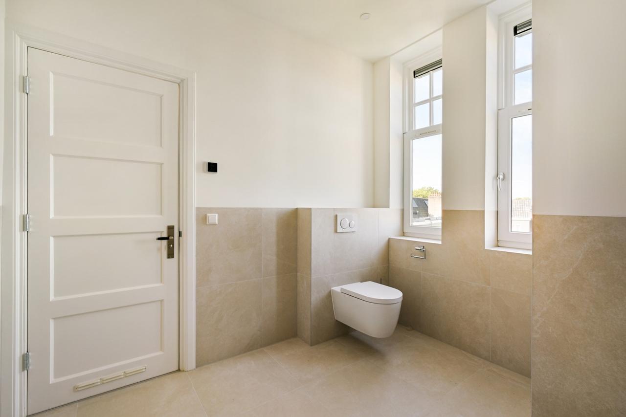 Wonen in een torenappartement in Stadionbuurt - Afbeelding 17