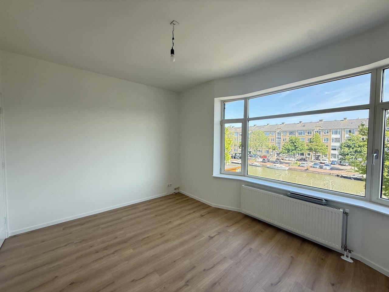 Dubbel bovenhuis met balkon aan het water - Afbeelding 4