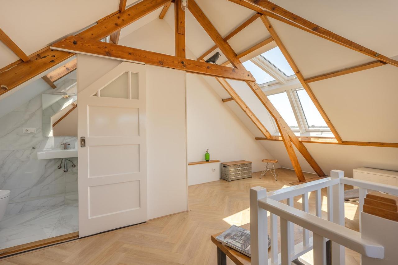 Hoekwoning met zonnige tuin in Wassenaar - Afbeelding 5