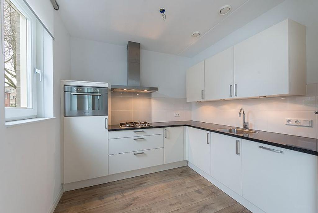 Patiowoning met slaapkamer en badkamer beneden - Afbeelding 2