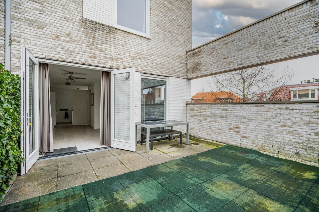 Licht 4-kamerhuis met garage in Leiden - Afbeelding 10