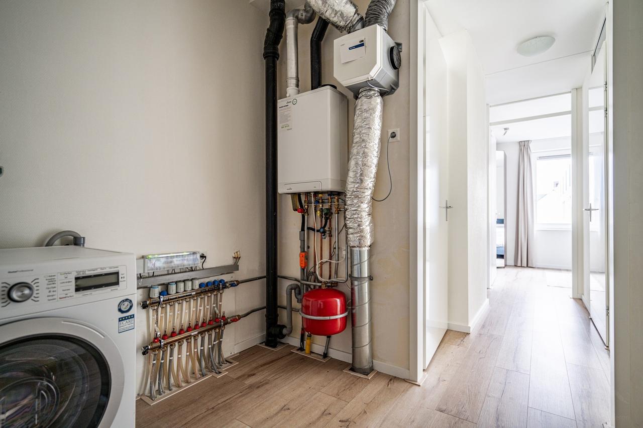 Licht 4-kamerhuis met garage in Leiden - Afbeelding 36