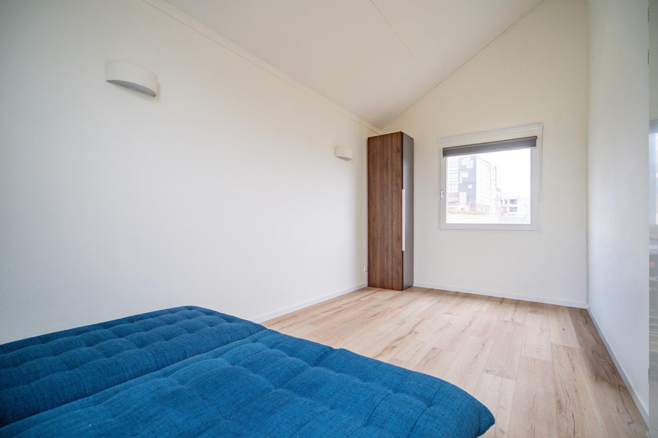 Licht 4-kamerhuis met garage in Leiden - Afbeelding 47