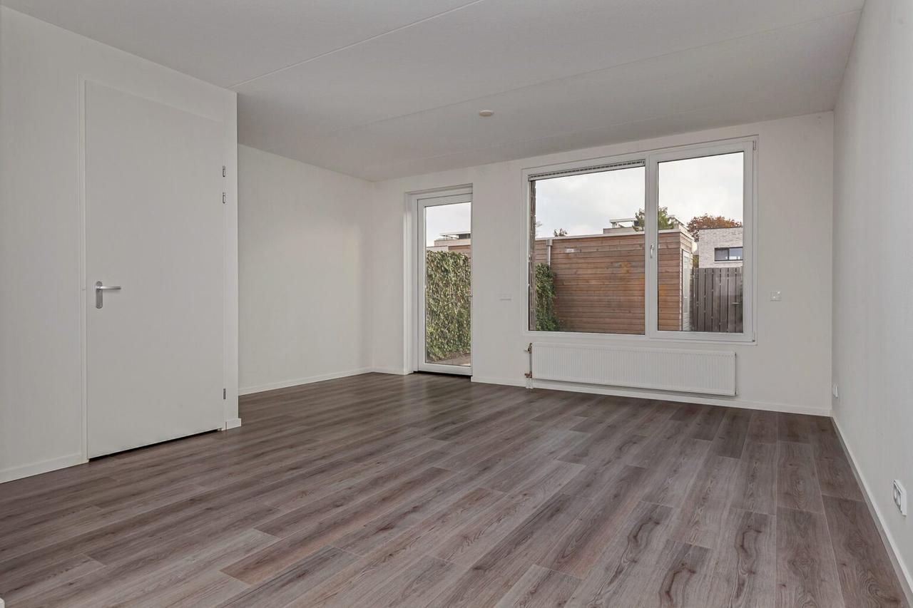 Tussenwoning met tuin en parkeerplek - Afbeelding 7