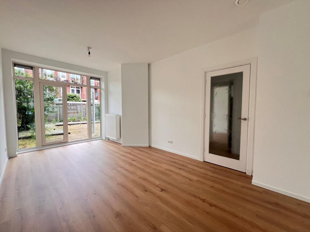 Parterre appartement met tuin en 2 slaapkamers - Afbeelding 1