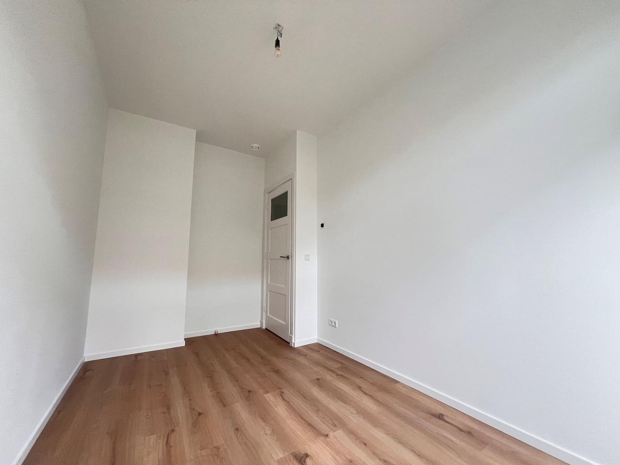 Parterre appartement met tuin en 2 slaapkamers - Afbeelding 14